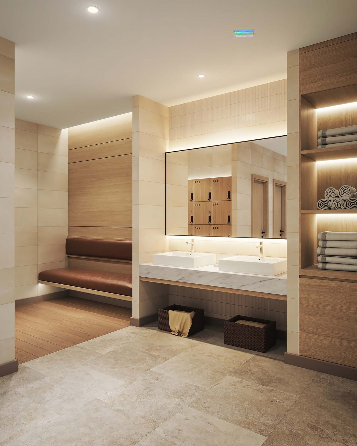 Khu vực bàn lavabo đá marble trắng và gương lớn trong phòng thay đồ cao cấp.