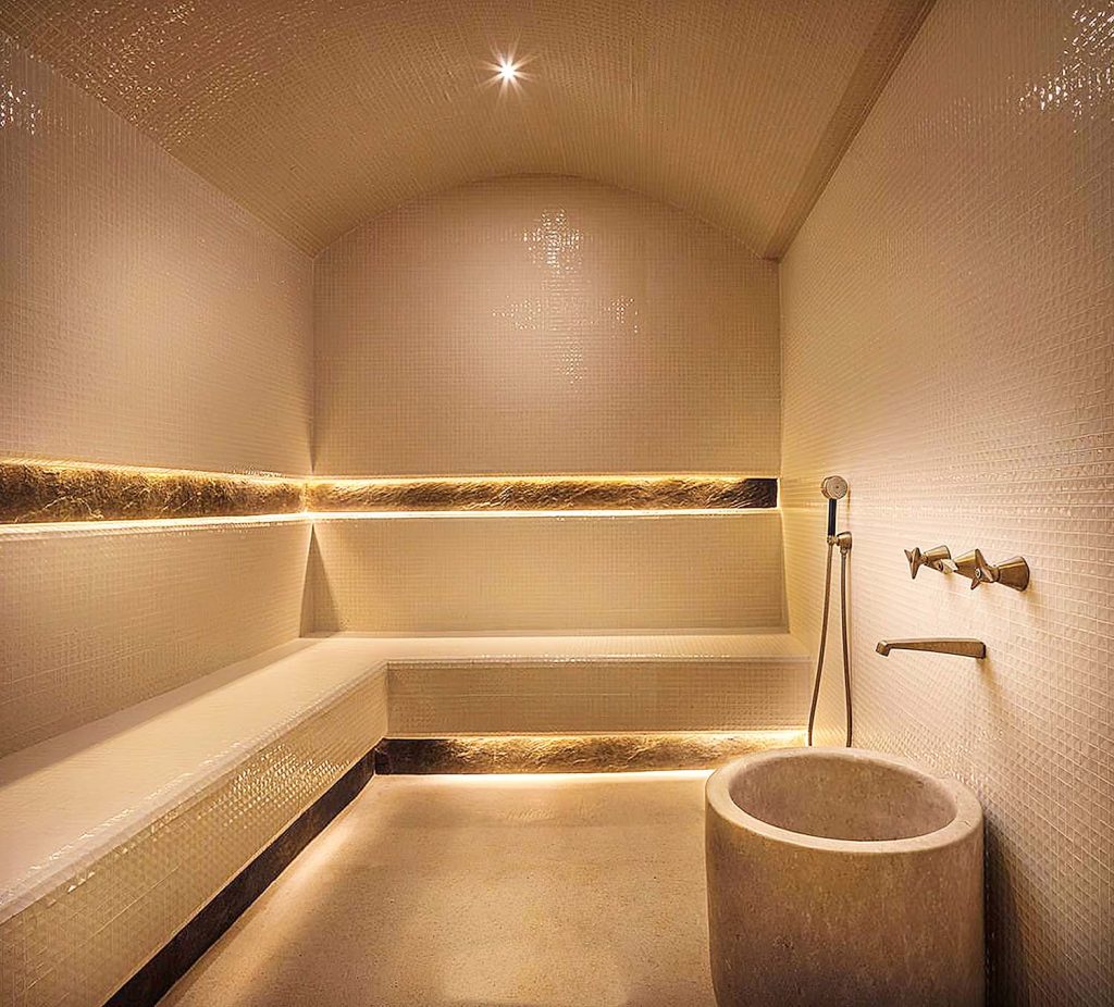 Mẫu thiết kế phòng xông hơi ướt cao cấp lát gạch mosaic trắng và hệ thống đèn led âm tường.